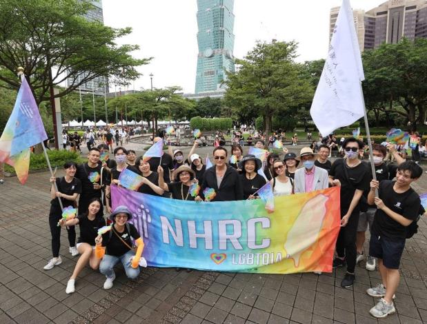 The NHRC distributed rainbow flags, tattoos, and other items at the parade to participants and bystanders