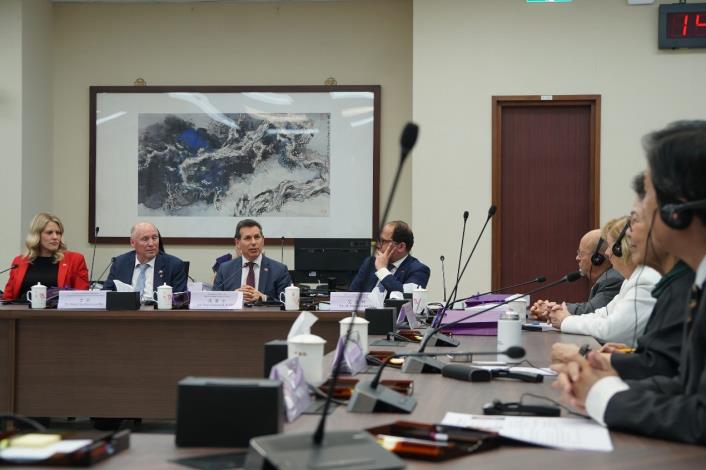 Delegation members engage in discussions with NHRC Commissioners
